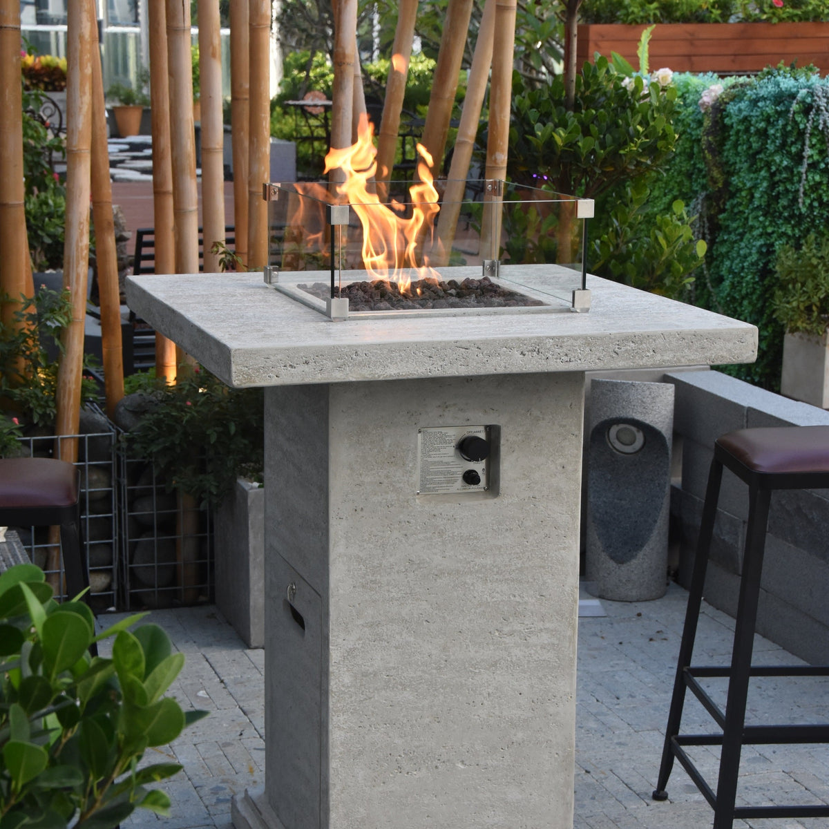 Elementi Montreal Bar Table - Outdoor Patio with Bar Stools & Bamboo Backdrop - Elementi Fires