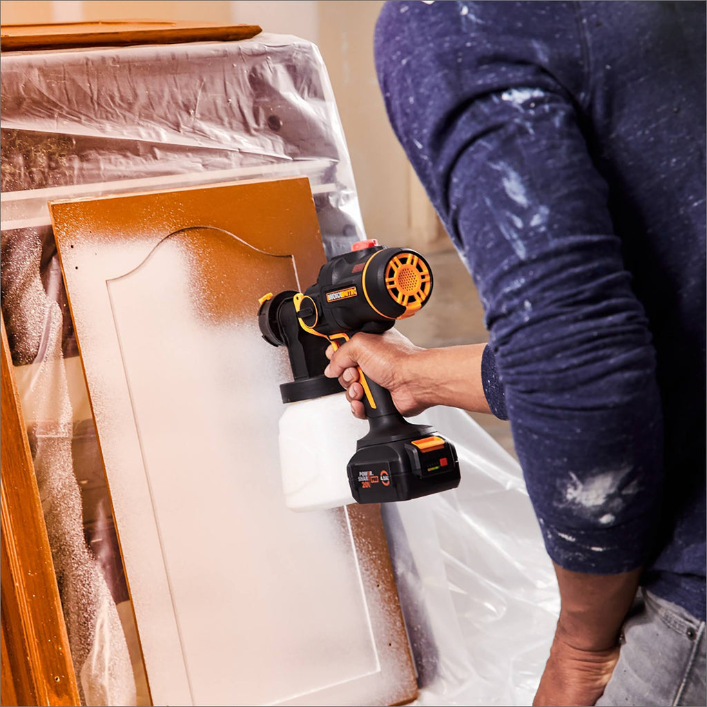Painting a cabinet door with the Worx Nitro cordless paint sprayer